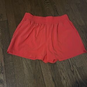 NWOT Athleta red/orange size M running shorts